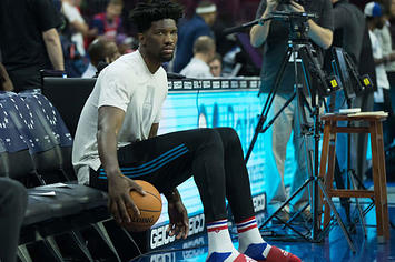 Joel Embiid sits on the bench.