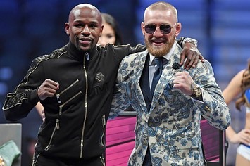 Floyd Mayweather and Conor McGregor pose after their big fight.