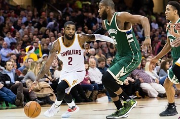 Kyrie Irving plays in a game against the Bucks.