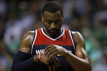 John Wall thinks about his 2K rating during game.
