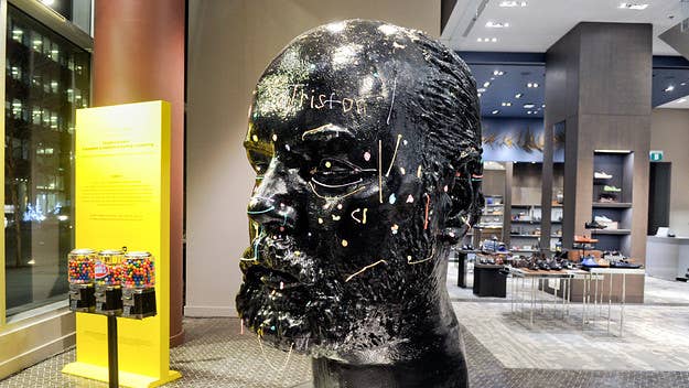 Toronto’s Holt Renfrew is encouraging guests to chew their gum and stick it on Douglas Coupland’s massive Gumhead sculpture.