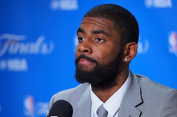 Kyrie Irving addresses reporters after NBA Finals game.