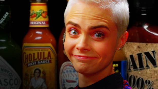 Watch Cara Delevingne take on the Hot Ones challenge with host Sean Evans. 