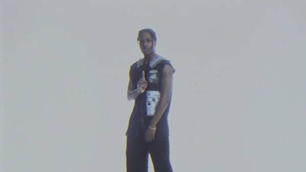 A breakdown of the Raf Simons visual lookbook that inspired the music video, and the rare Raf pieces ASAP Rocky, Quavo, and Playboi Carti wore in the "RAF."