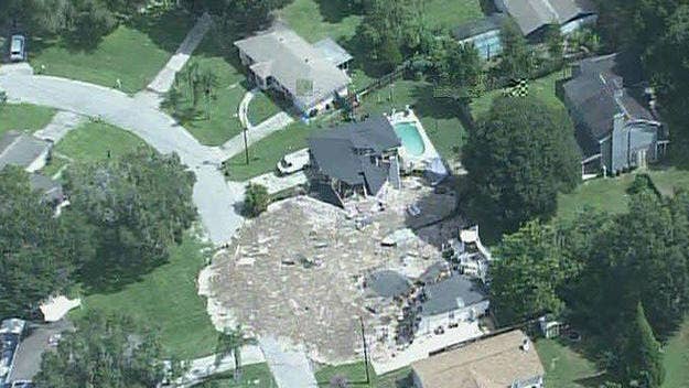 A giant sinkhole in Florida has swallowed up a pair of perfectly good houses.