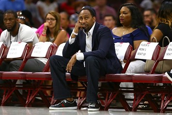 Stephen A. Smith sits courtside at a Big3 game.