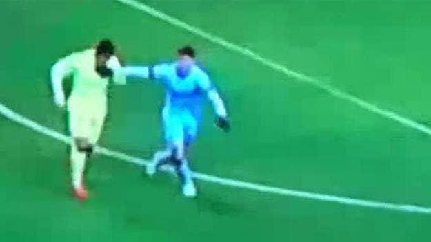 Did Luis Suarez try to bite Martin DeMichelis? You be the judge.