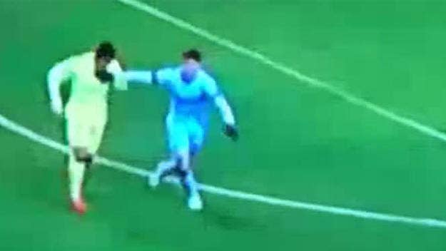 Did Luis Suarez try to bite Martin DeMichelis? You be the judge.