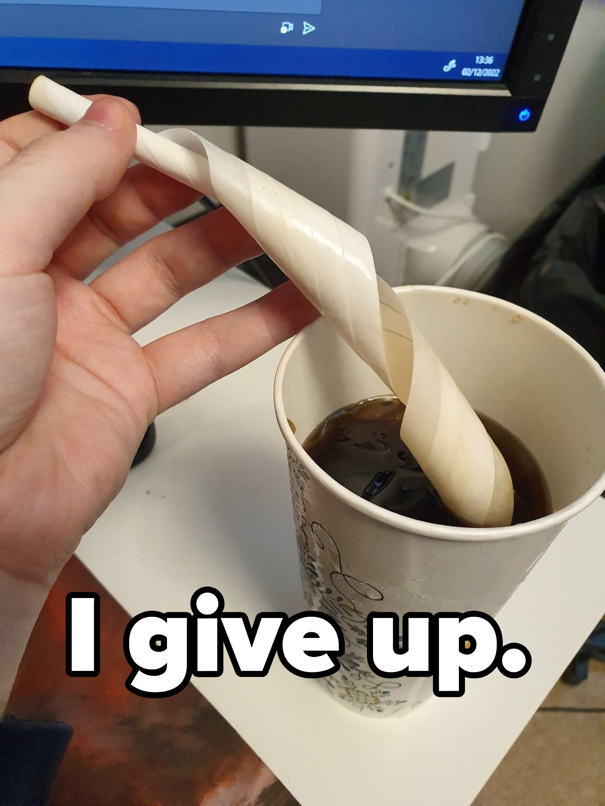 an unrolled straw and the words &quot;I give up&quot;