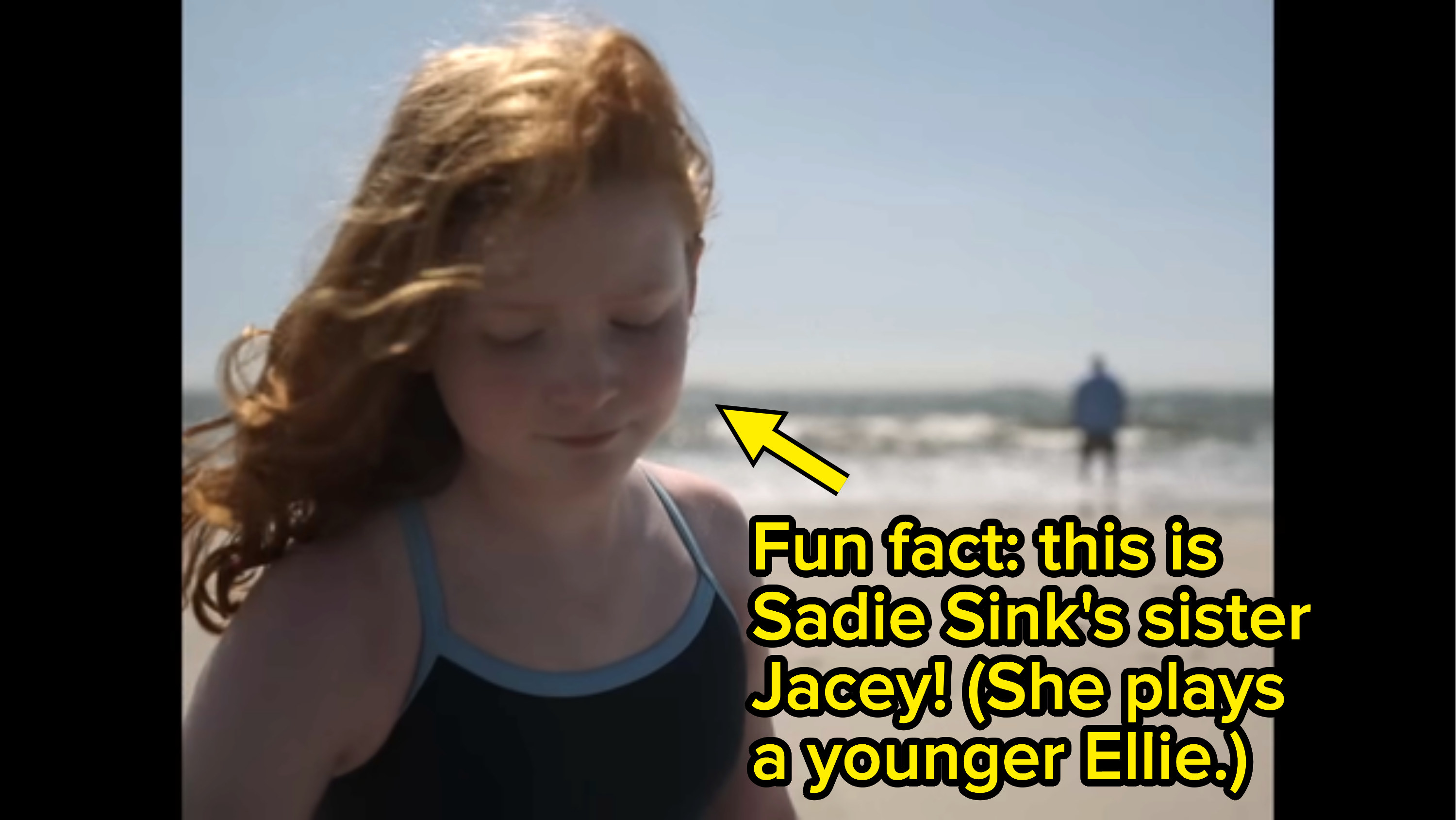 Ellie on the beach as a young girl, with a note saying that young Ellie is played by Sadie Sink&#x27;s real-life sister