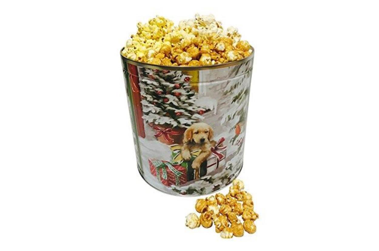 A large, overflfowing popcorn tin