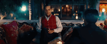 Movei gif: Tobey Maguire in creepy makeup doing a creepy eye shift