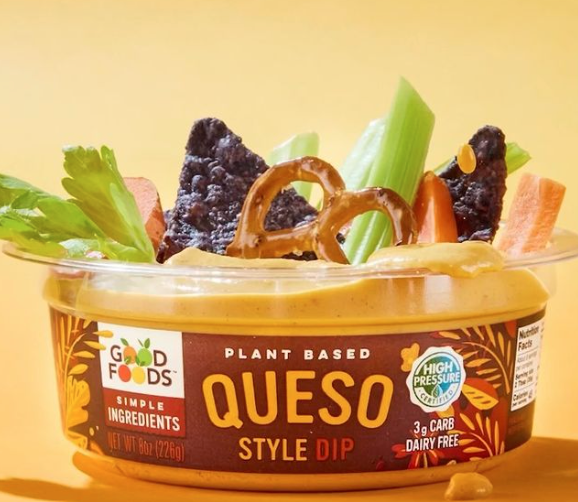plastic tub of plant based queso dip