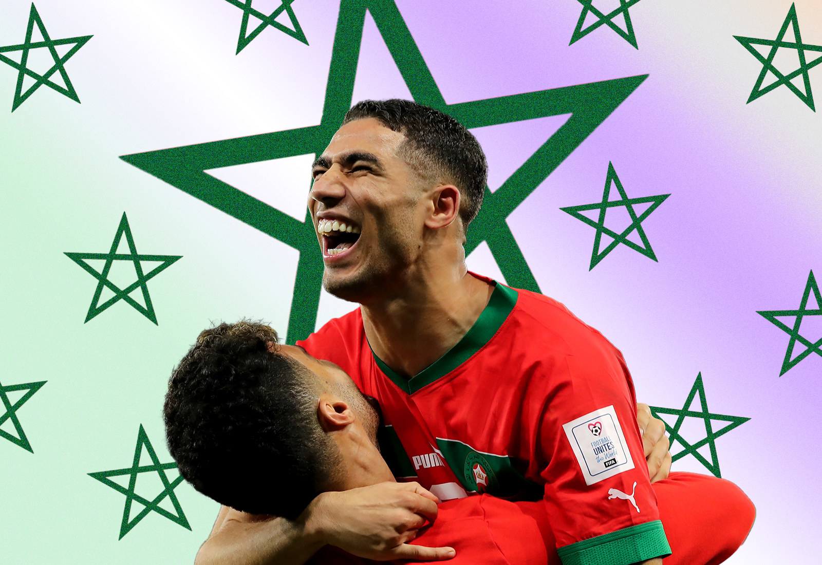 Soccer player Achraf Hakimi smiles as he is embraced by a teammate