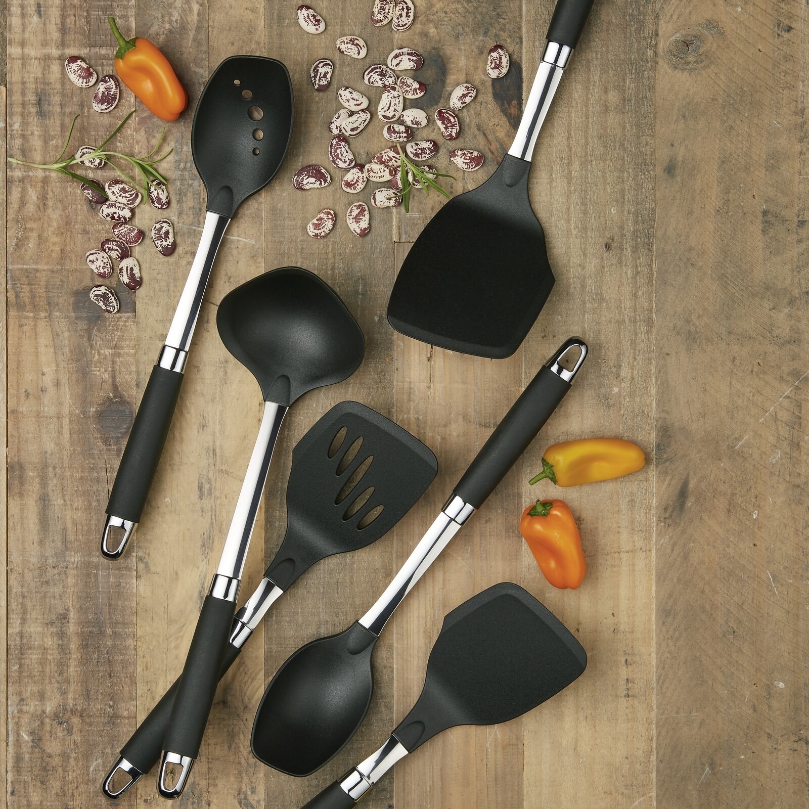 The utensil set styled on a cutting board