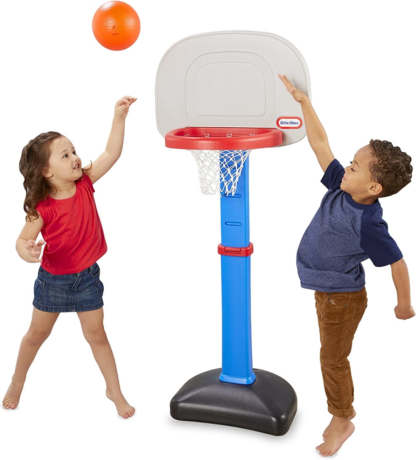 Two kids playing basketball