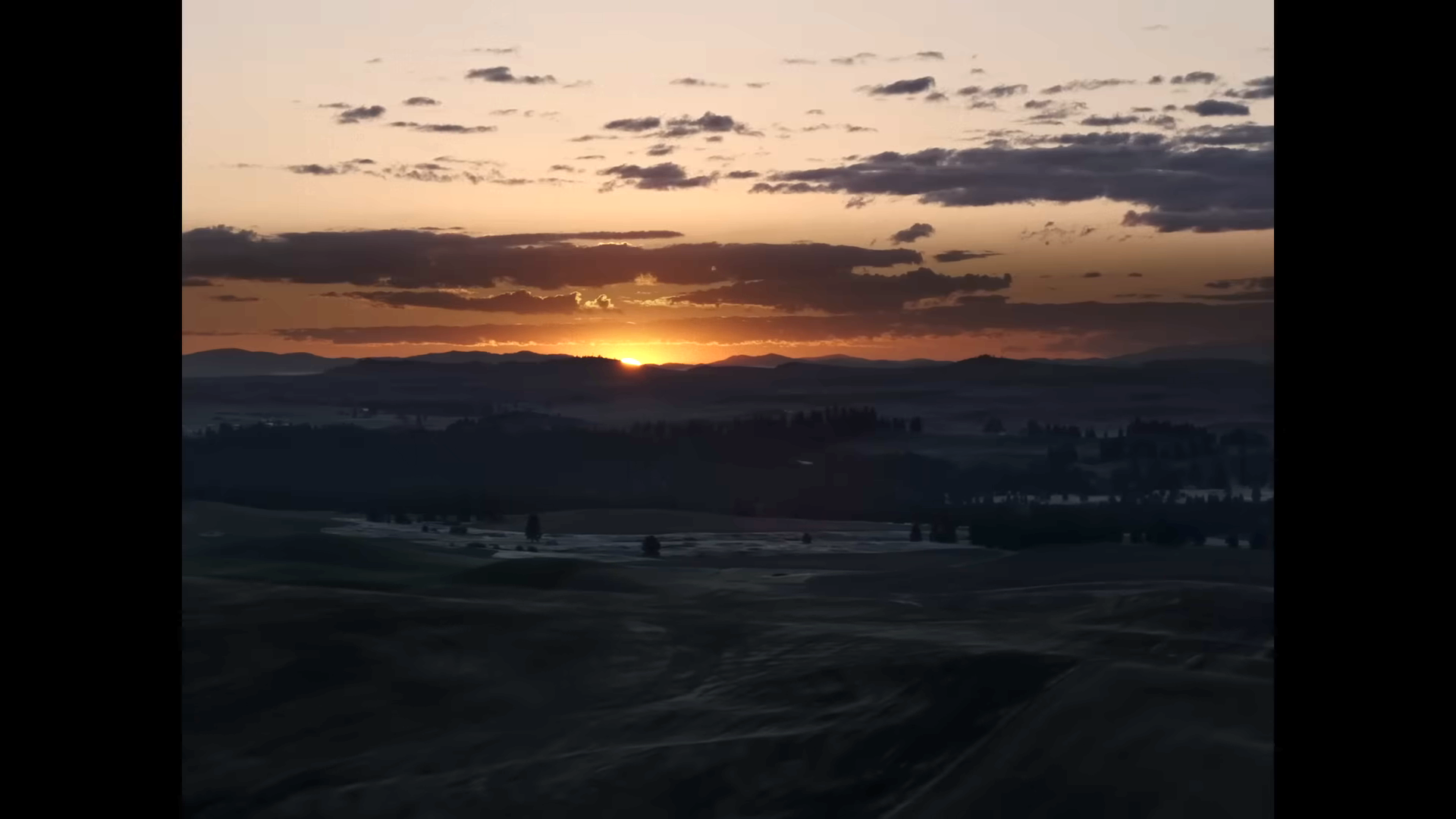 The sun rising on a horizon in Idaho