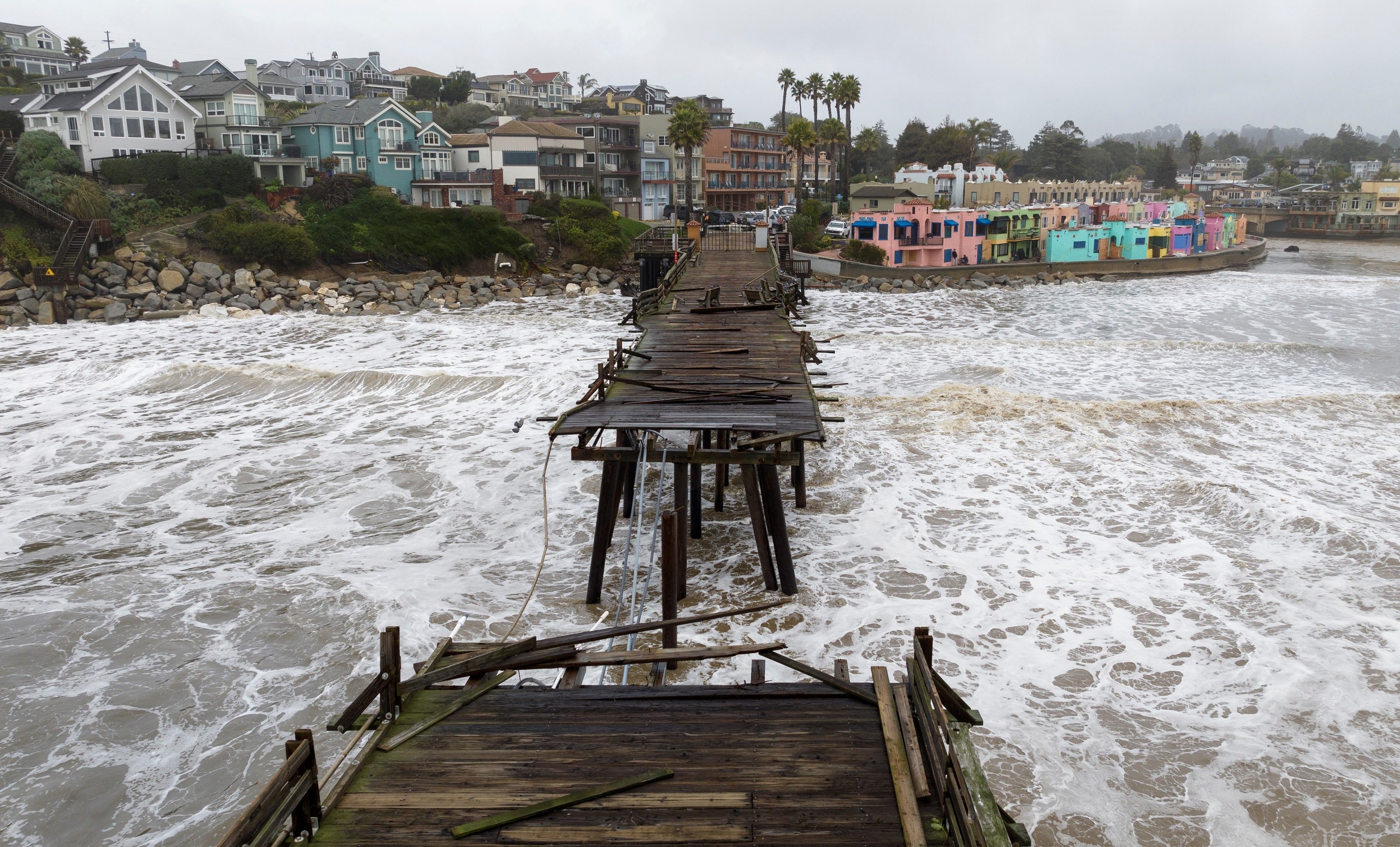 Aerial view shows a damaged pier is split in Capitola, California, on January 9, 2023