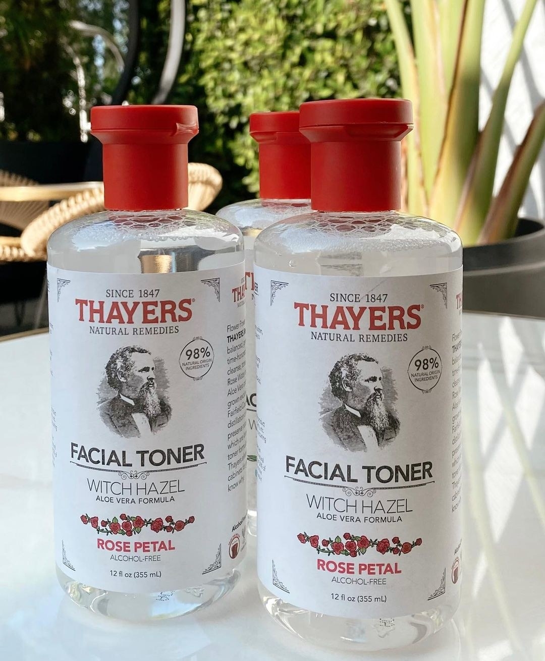 Three bottles of toner on a table