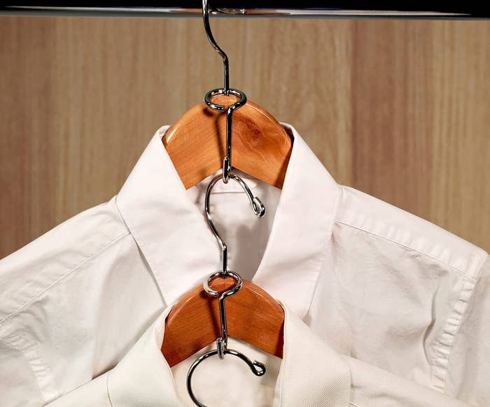 a set of hanger extenders hung on a clothes hanger
