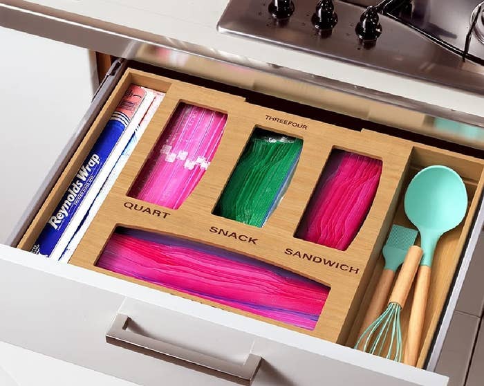 an open drawer with the ziploc bag organizer inside