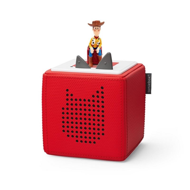 a red toniebox with a toy story tonie