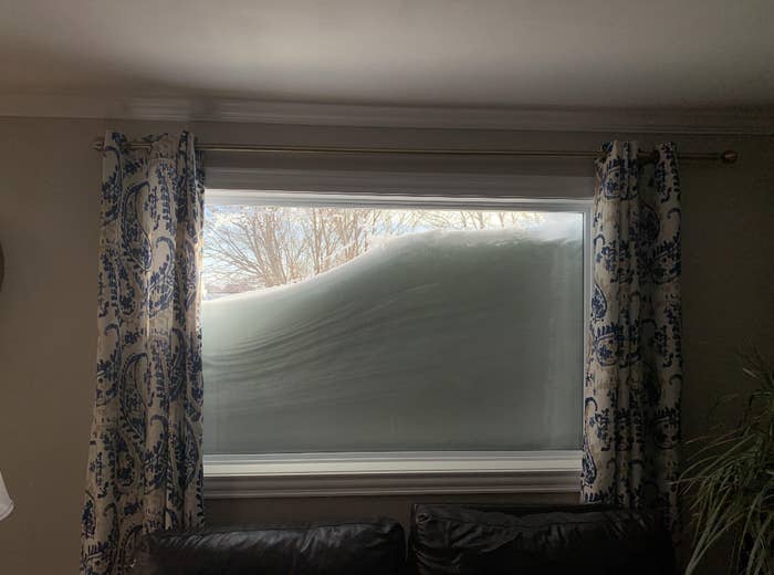 A snow-covered window
