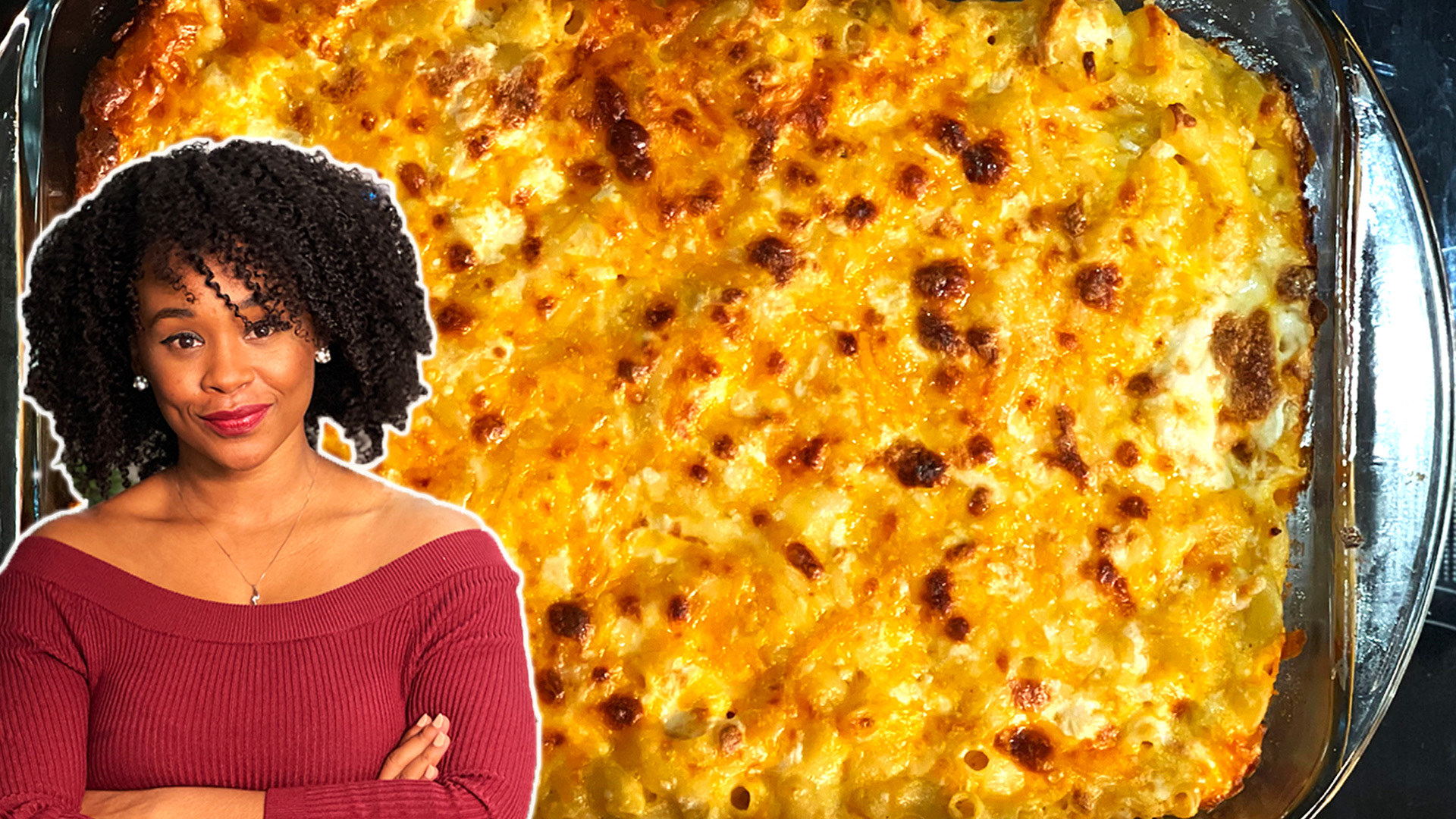 A woman standing in front of mac &#x27;n&#x27; cheese