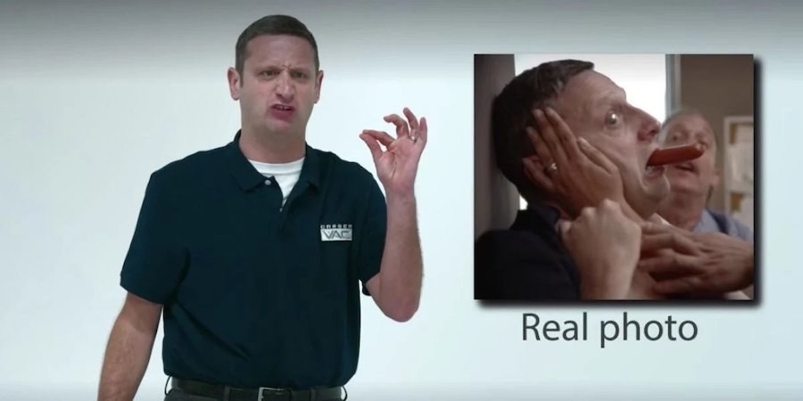 tim robinson wears a polo and scrunches his brow as if mad. next to him superimposed on the screen is an image of him choking on a hot dog.