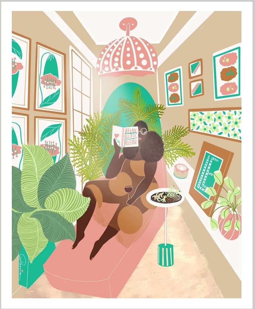 A print of a Black woman relaxing surrounded by plants, with a cup of wine and a book that reads &quot;relax, relate, release&quot;