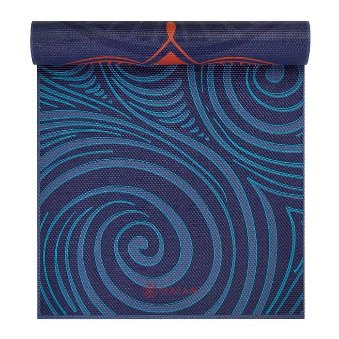Blue yoga mat with a swirl pattern