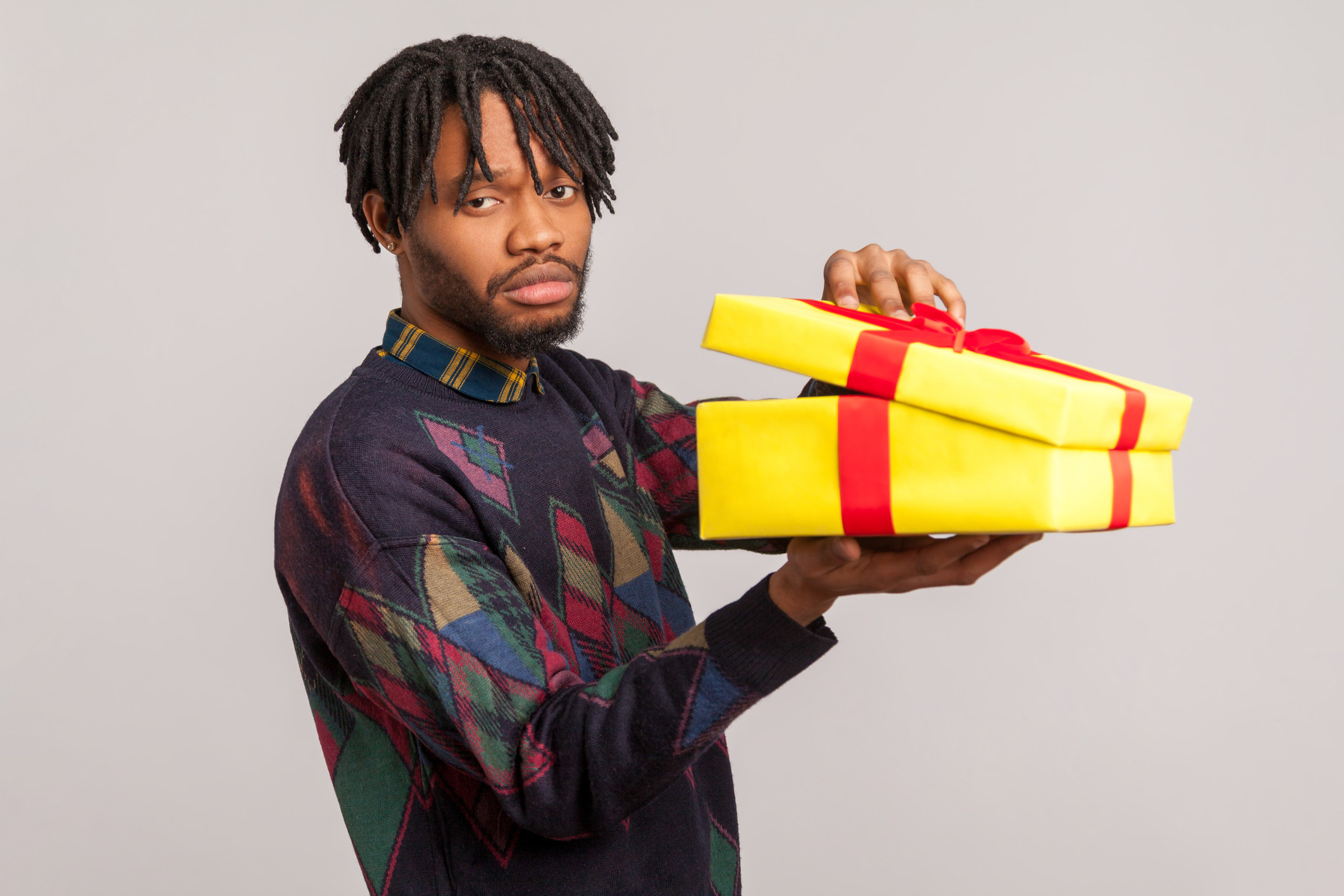 A man holding a present