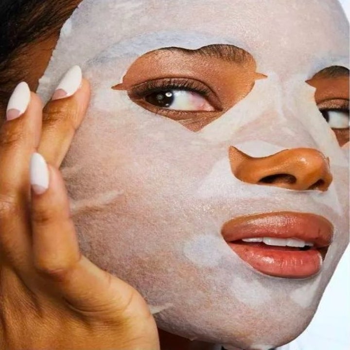 Model with face mask