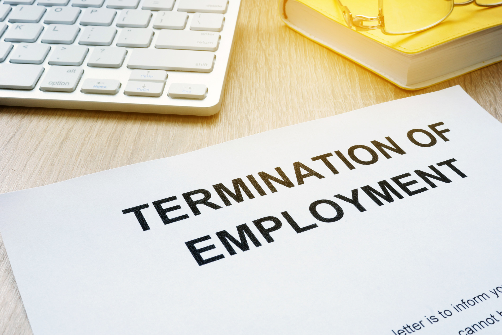 Termination of employment sheet on office desk