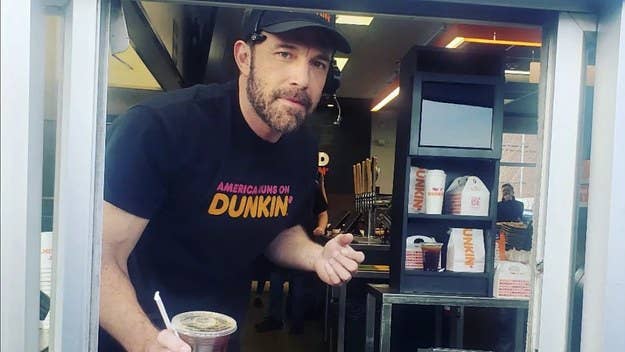 The 50-year-old actor was spotted handing out caffeinated drinks during a reported commercial shoot, where wife Jennifer Lopez also made a guest appearance. 