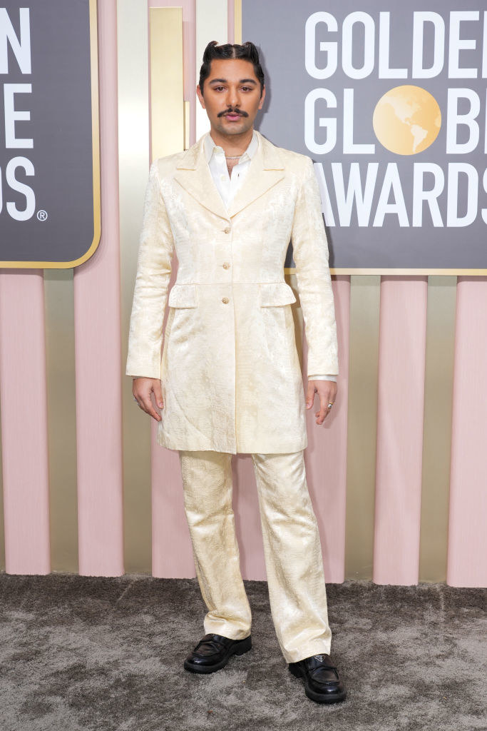 Mark Indelicato attends the 80th Annual Golden Globe Awards in a pastel suit
