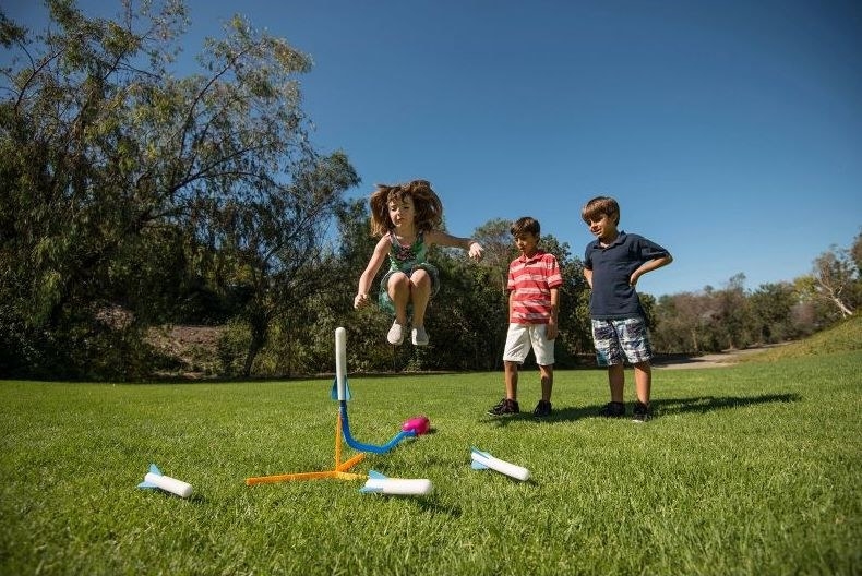 kids play with the stomp rockets