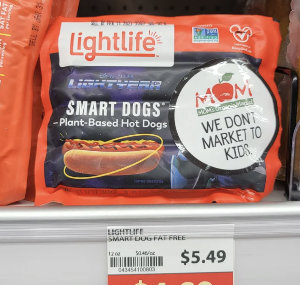 Smart Dogs hot dog packaging with image covered with &quot;We don&#x27;t market to kids&quot; sticker
