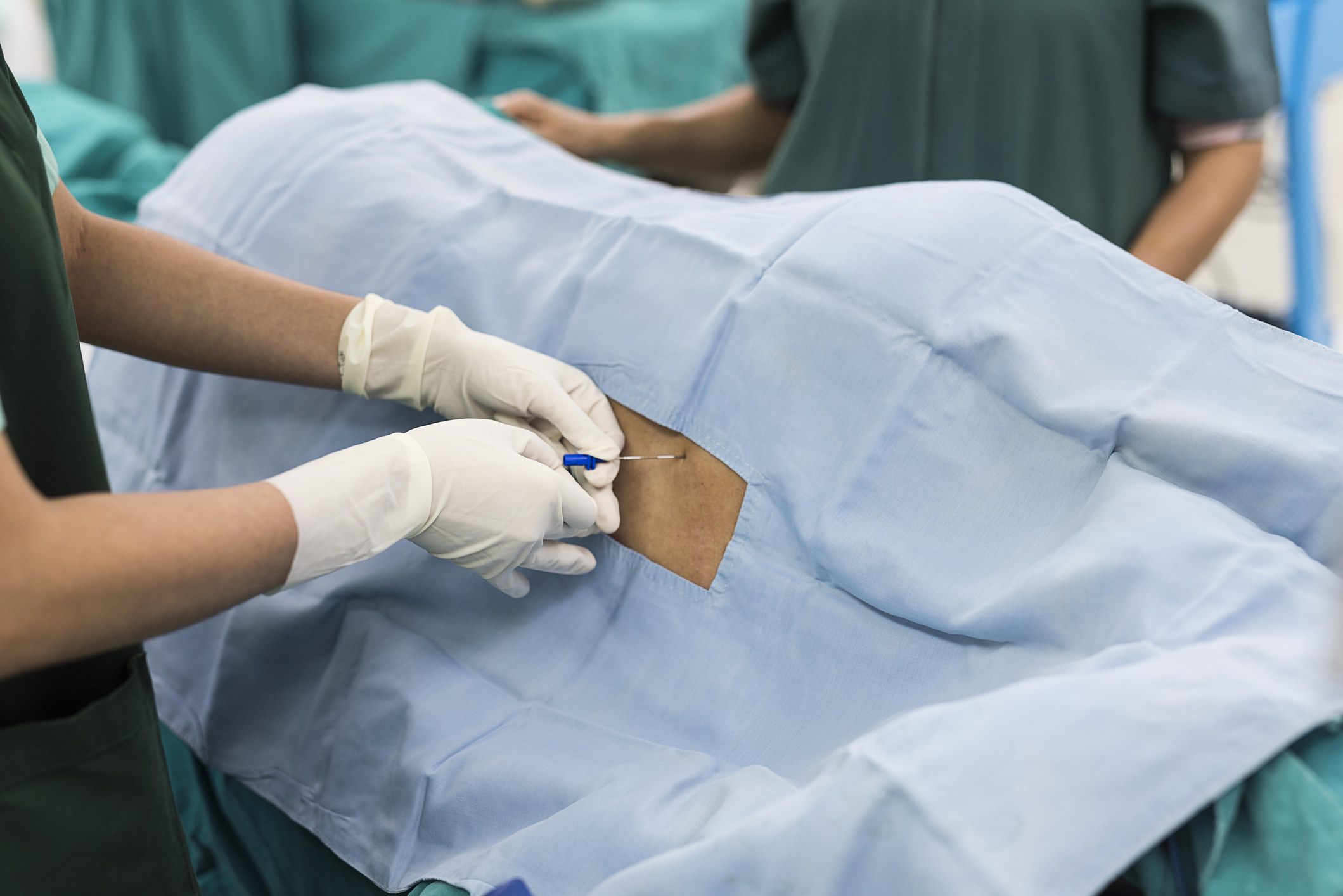 An epidural being administerd to a patient