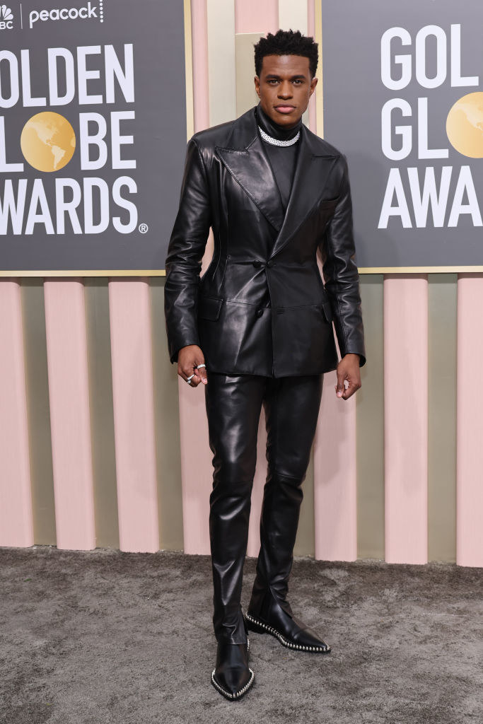 Jeremy Pope attends the 80th Annual Golden Globe Awards in a leather suit