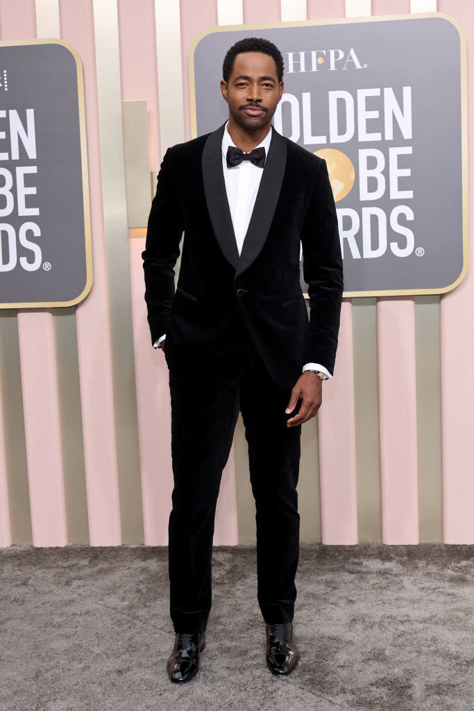 Jay Ellis attends the 80th Annual Golden Globe Awards in a velvet suit