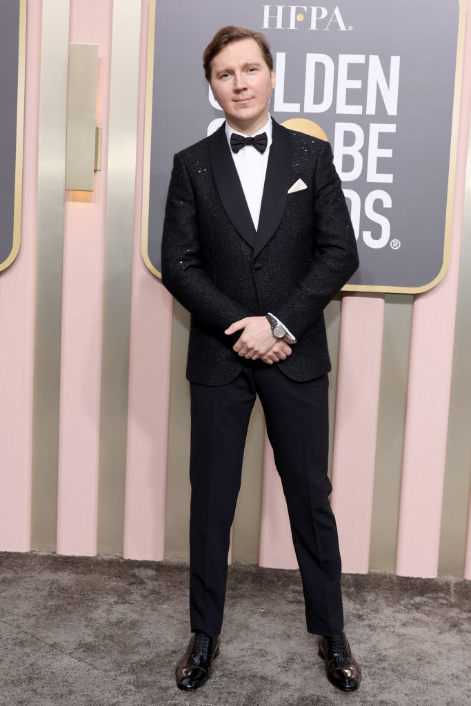 Paul Dano attends the 80th Annual Golden Globe Awards in a  sparkling suit