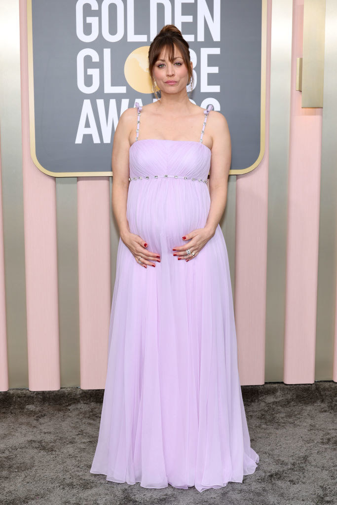 Kaley Cuoco attends the 80th Annual Golden Globe Awards pregnant in a pastel gown