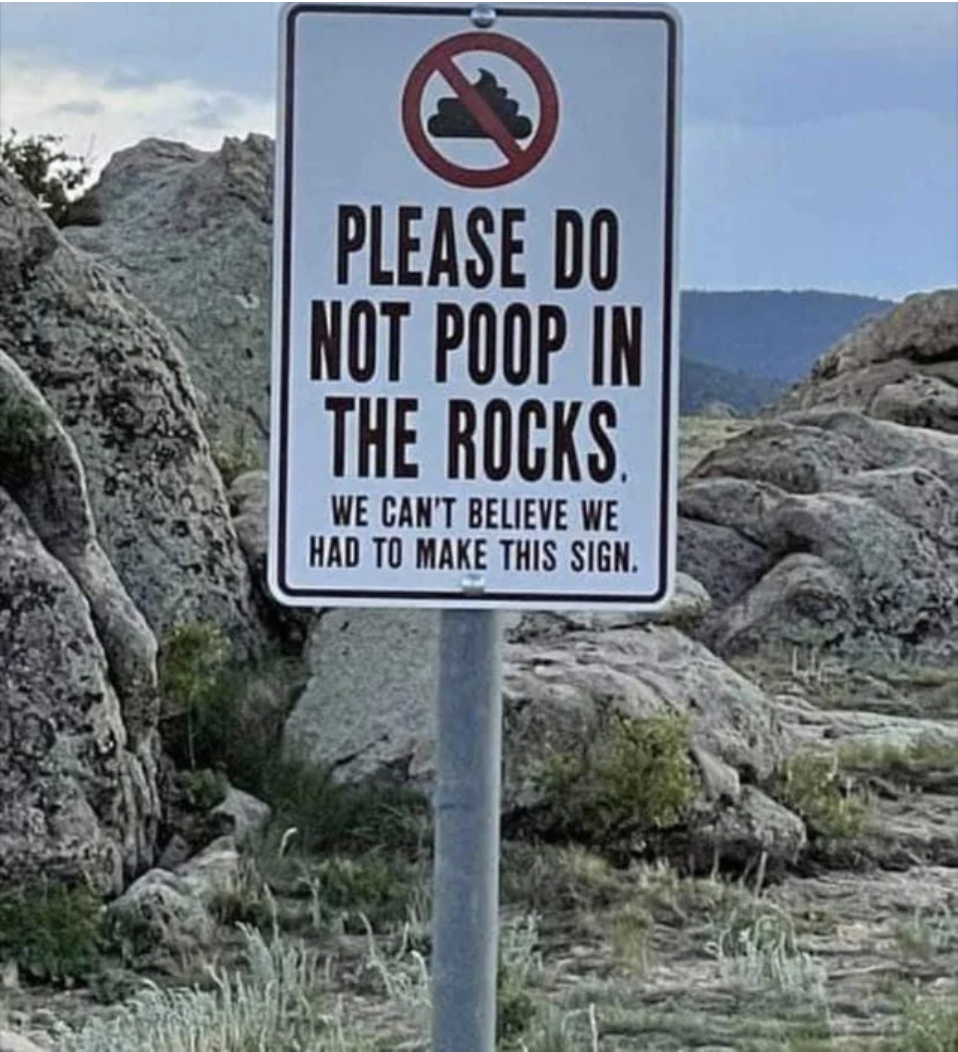 The sign says &quot;please do not poop in the rocks, we can&#x27;t believe we had to make this sign&quot;