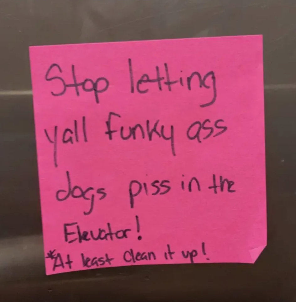 A Post-It stuck to an elevator says &quot;stop letting y&#x27;all funky-ass dogs piss in the elevator, at least clean it up&quot;