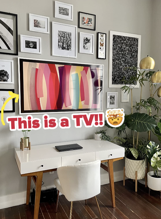 A reviewer's frame TV mounted on a gallery wall so you can't even tell it is a TV