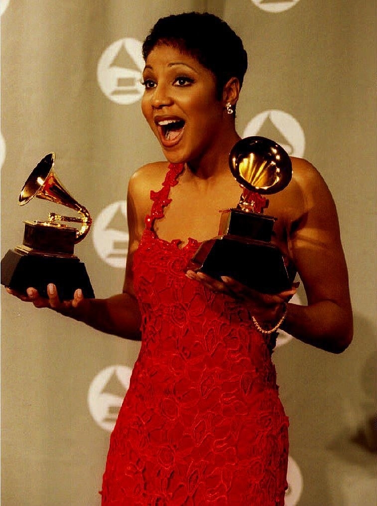 Toni Braxton with her Grammys