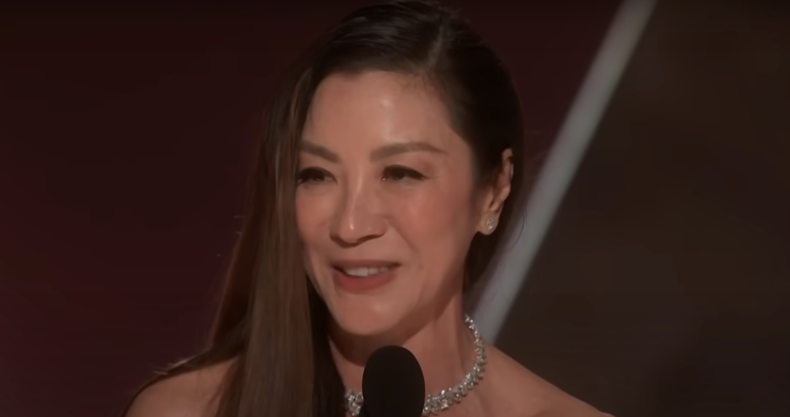 A closeup of Michelle during her acceptance speech