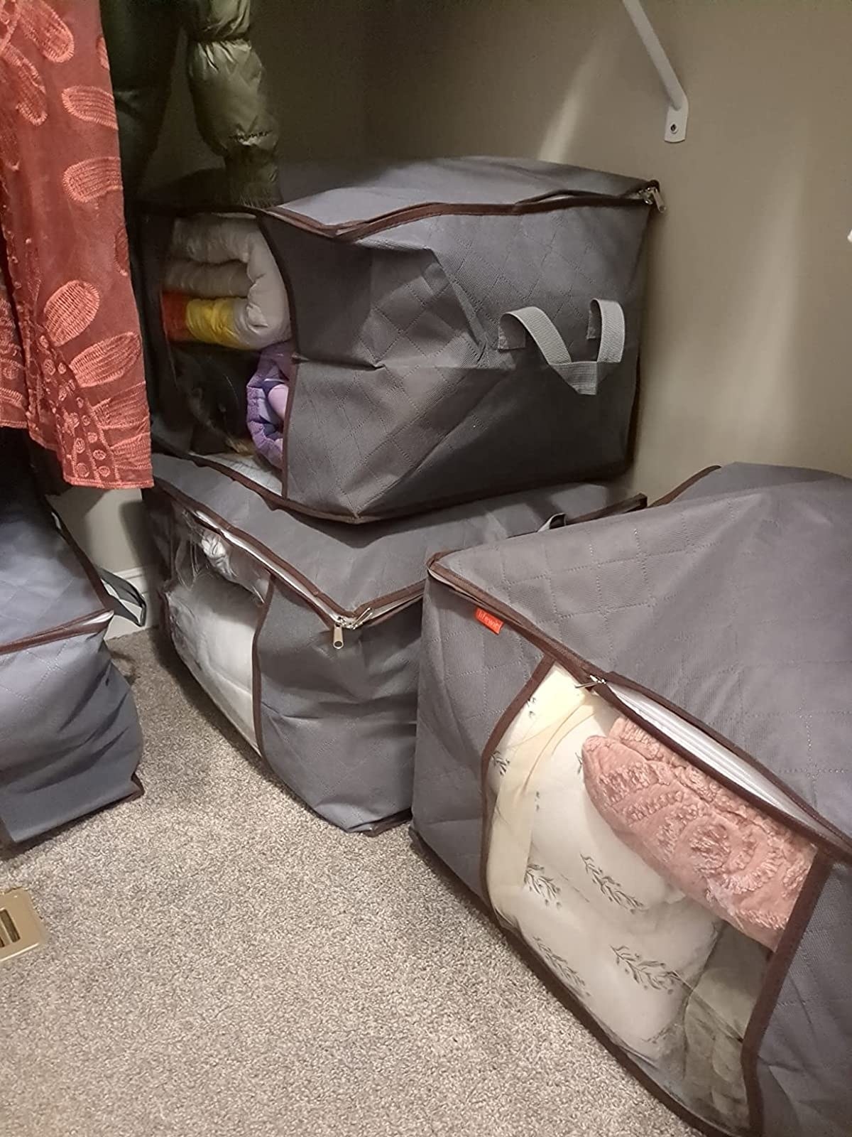 Reviewer image of storage bags in their closet