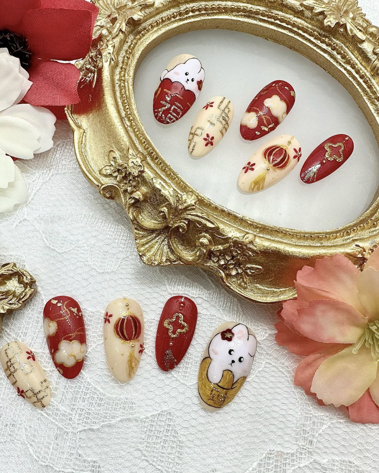 Year of the Rabbit themed press on nails around gold and red accent pieces